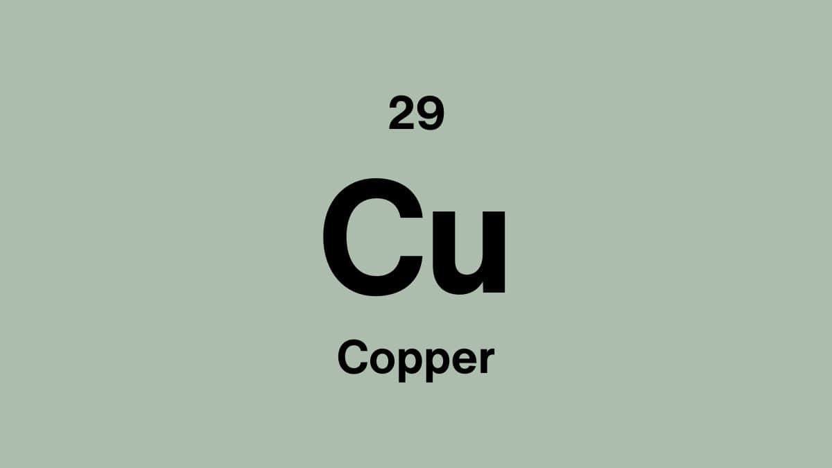 Copper element symbol Cu, atomic number 29, on a sage green periodic table tile